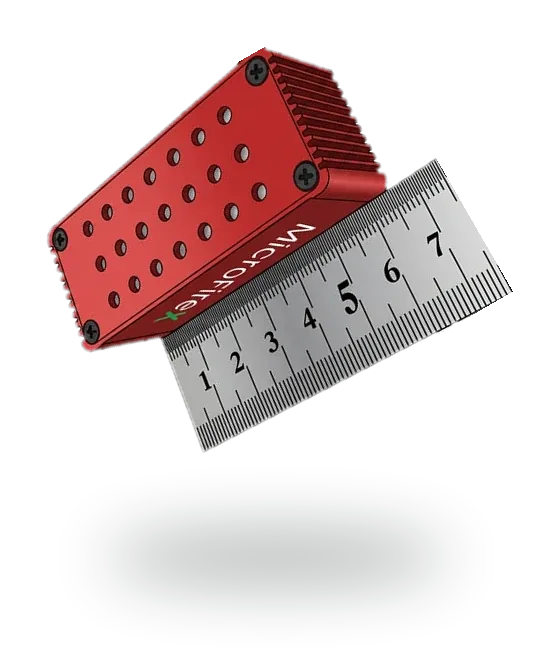 MicroFireX compact automatic fire extinguisher shown at actual size, 66 x 27 x 20 mm, next to a ruler